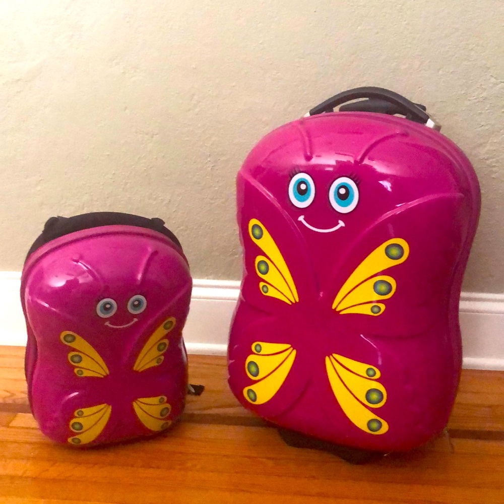 Travel Buddies butterfly wheeled case and matching backpack. Very gently used